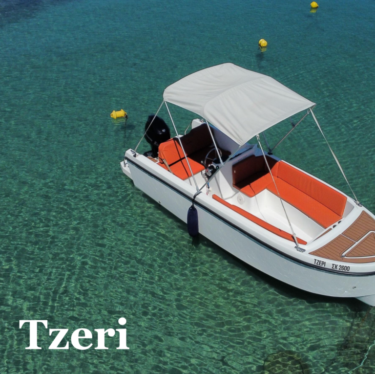 A small boat with a white canopy and red cushions anchored in calm water.